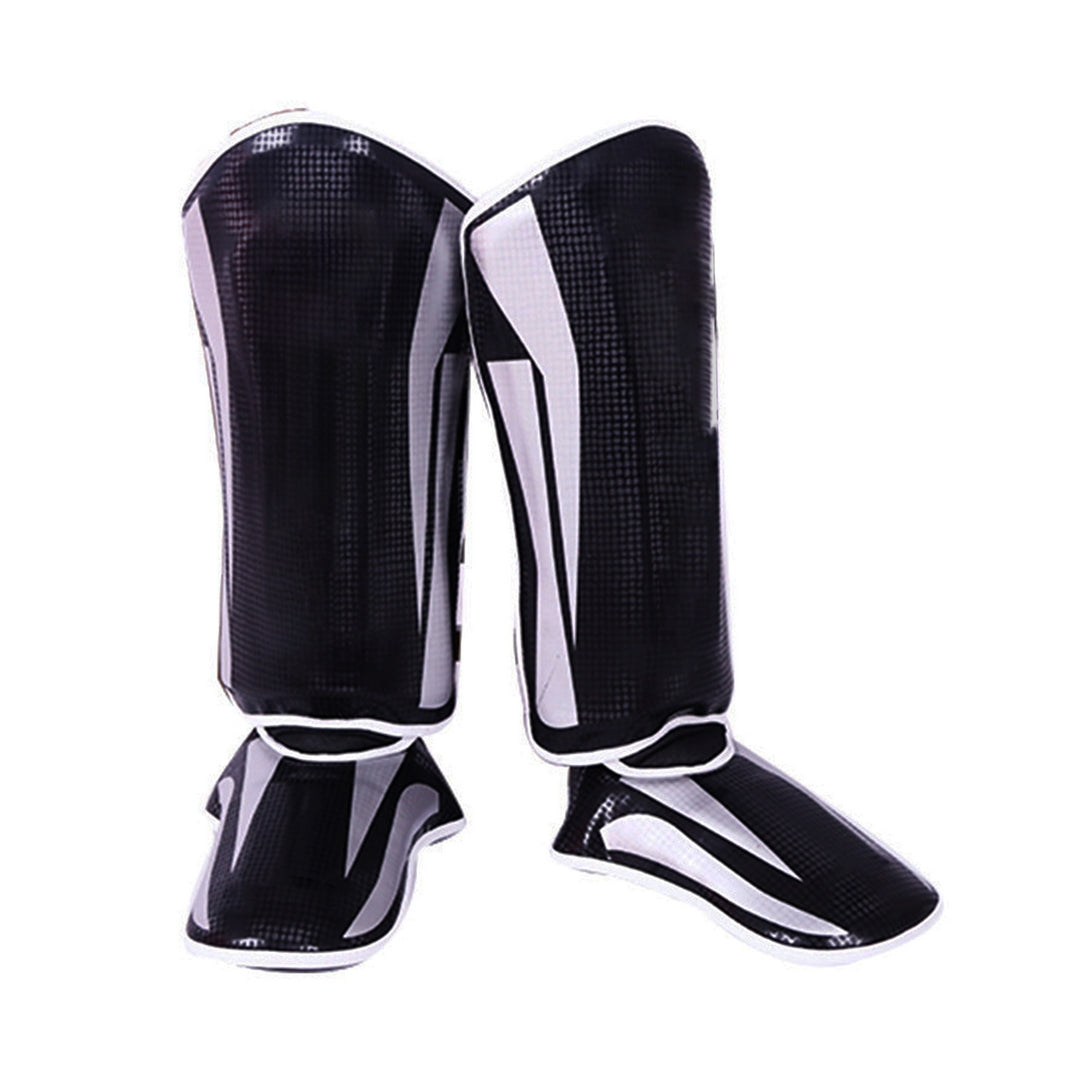 Endless Martial Arts Schienbeinschützer | Material: Kunstleder | Verstellbare thailändische Beinschützer mit Spannschutz für Kickboxen, MMA Training & Sparring | Professionelle MMA Ausrüstung | Männer & Jungen